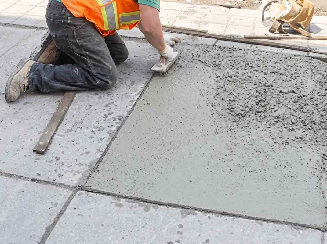 Professional repairing a concrete floor in Wichita, KS