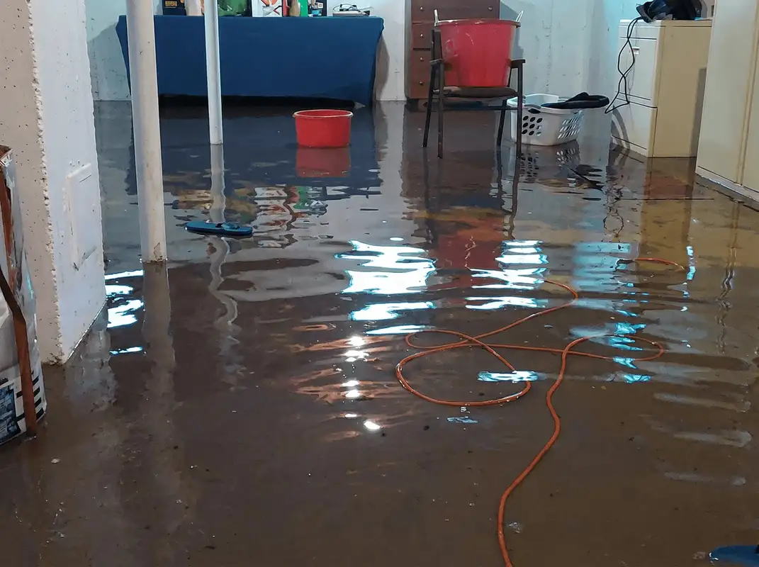 Basement with boiler, cabinets and washing machine completely flooded in Wichita, KS